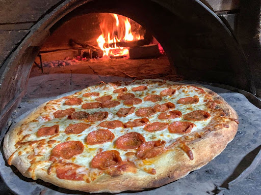 Maxxi pizza artesanal a la leña partido dajabon en Pajabon 63000 y Pizzería